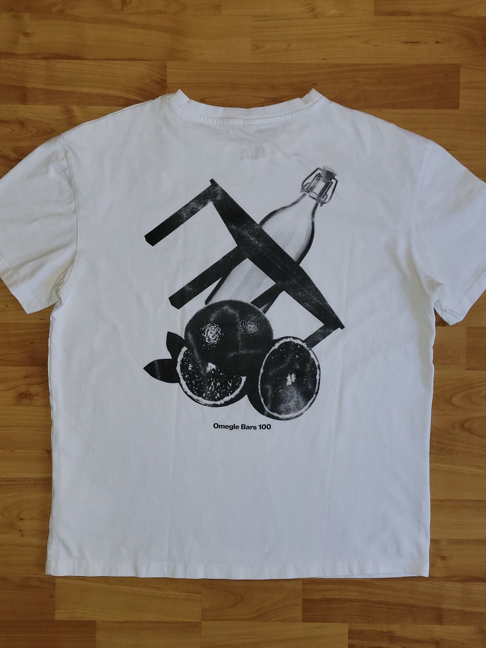 White Short-Sleeve Graphic Tee with Black Print